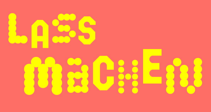 Der Text "Lass machen" in gelber Schrift vor rotem Hintergrund